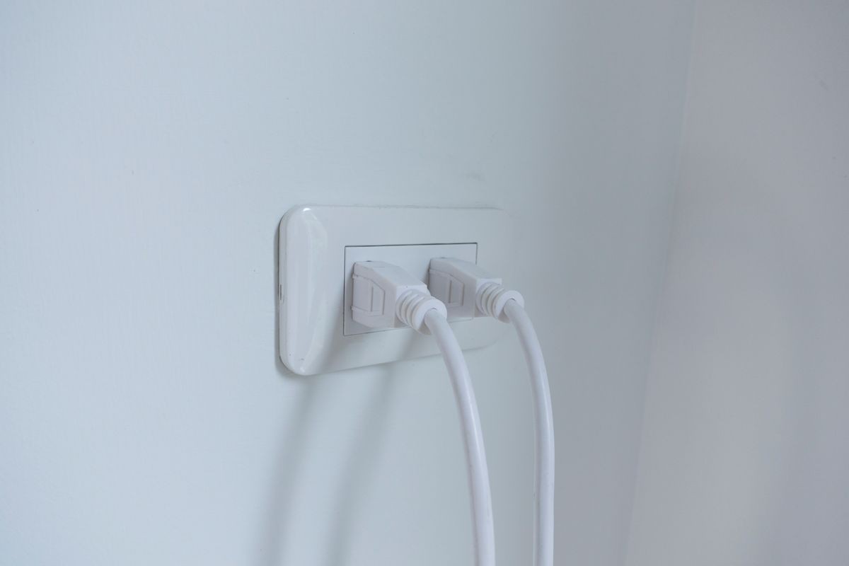 white power point with 2 wires plugged in